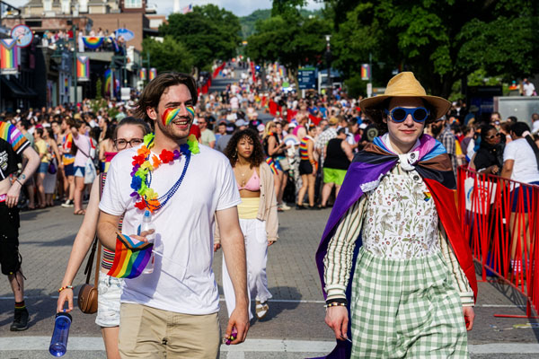 people walking in pride parade fayetteville arkansas
