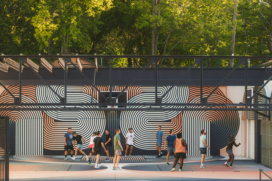 Guys playing basketball