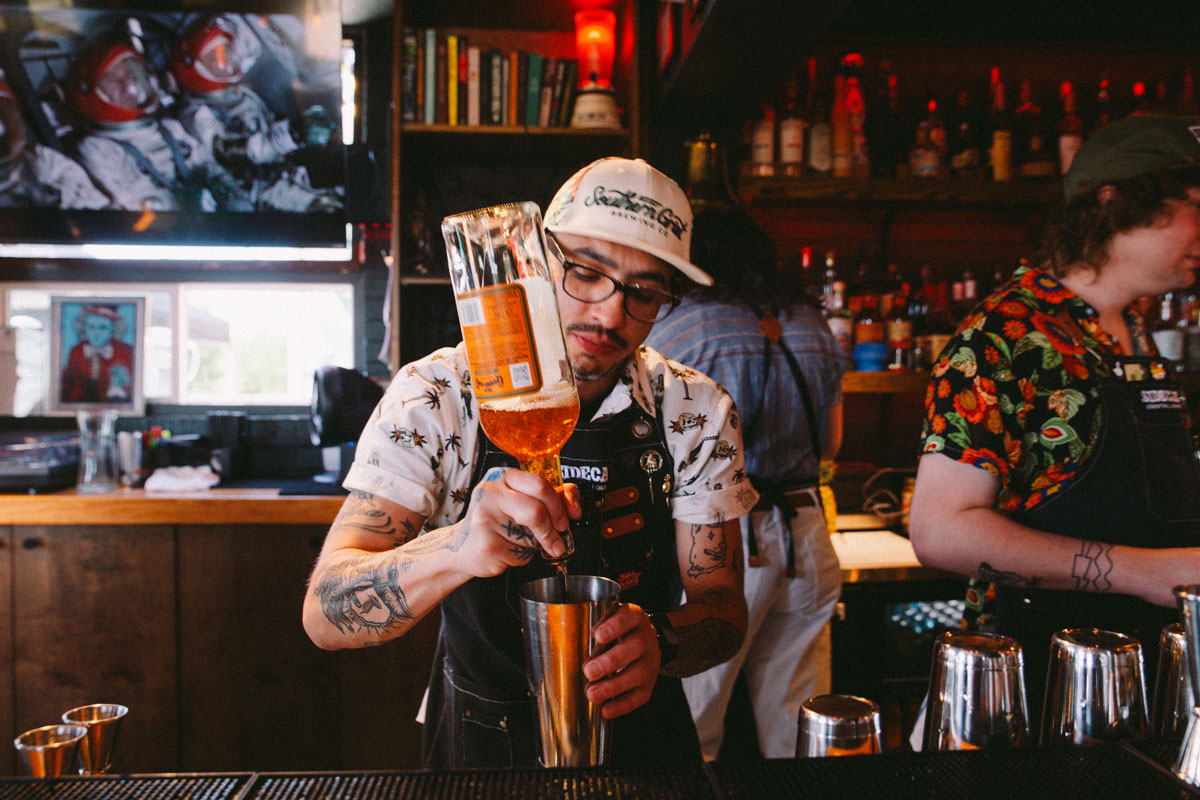 bartender making drink at Sidebar Cocktail Lounge