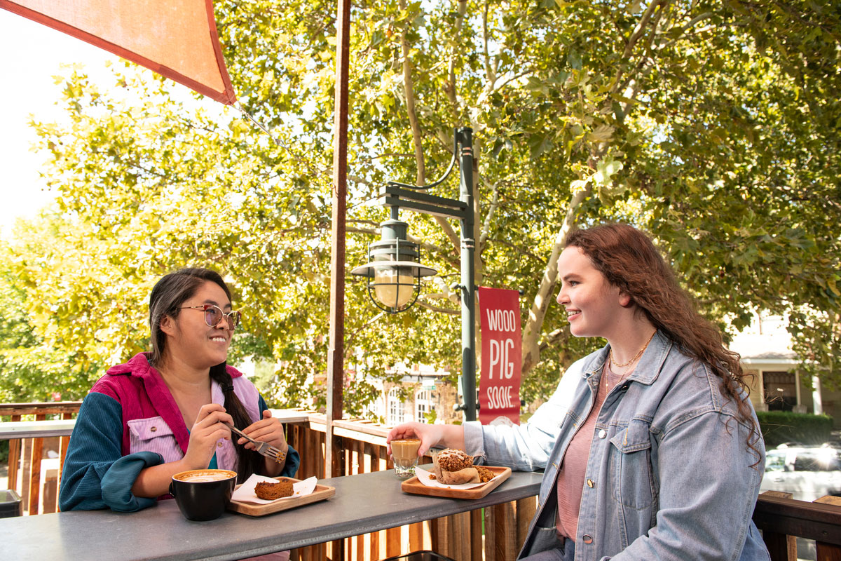 women enjoying meal at Puritan Coffee