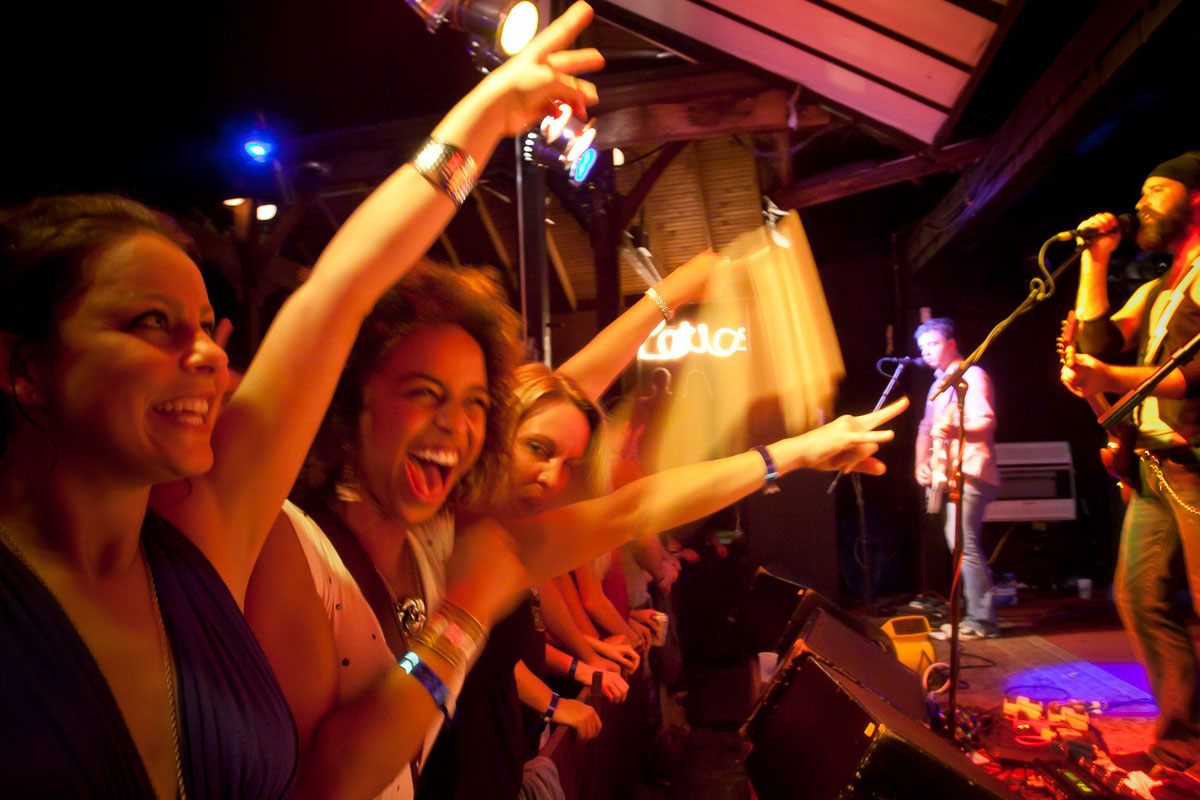 women in front row against stage during concert at Georges Majestic Lounge